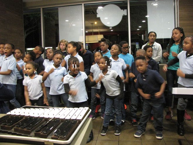 Caring and Sharing Learning School students sang and danced at Family Night at McDonald's Restaurant.