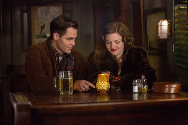 Chris PIne, left, and Holliday Grainger star in "The Finest Hours," a heroic action-thriller based on the true story of a daring Coast Guard rescue in Chatham. CLAIRE FOLGER/DISNEY