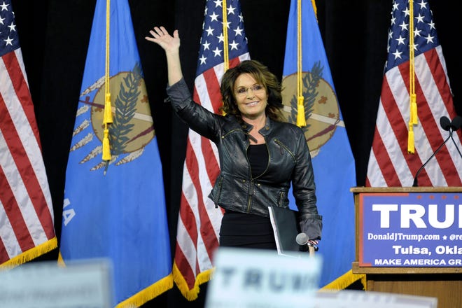 Sarah Palin waves to the crowd at a Donald Trump campaign rally in Tulsa, Okla., last week. AP PHOTO