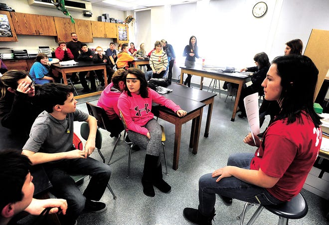 Claymont High School student Kenzie Herron leads seventh-graders in a game of “anti drug abuse” Jeopardy as part of the National Drug and Alcohol Facts Week-Shatter the Myths Thursday at Claymont Junior High in Uhrichsville.