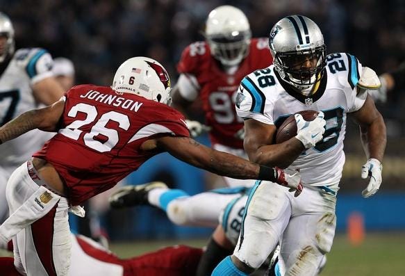 If the Carolina Panthers can establish Jonathan Stewart (28) on the ground, they'll keep the Denver Broncos pass rush on its heels.