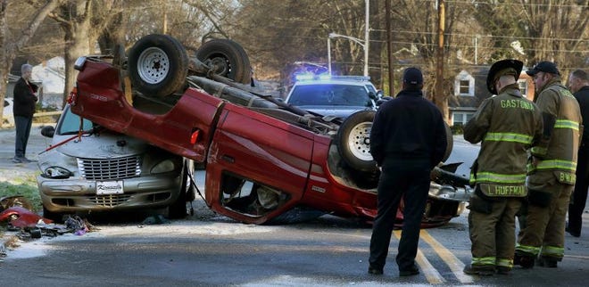 (Photo Mike Hensdill/The Gaston Gazette) Gastonia Police and Gastonia Fire and Rescue on the scene of an early morning wreck at the intersection of South Clay Street and West Harvie Avenue Friday, January 29, 2016.