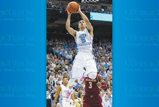 North Carolina's Marcus Paige (5) drives to the basket in the first half against Boston College's Eli Carter (3) on Saturday, Jan. 30, 2016, at the Smith Center in Chapel Hill, N.C. (Robert Willett/Raleigh News & Observer/TNS)