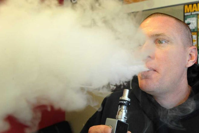 E-cigarettes, or vaporizers, are devices that are battery-operated and usually use an atomizer to heat a refillable cartridge that allows users to inhale a vapor containing nicotine.