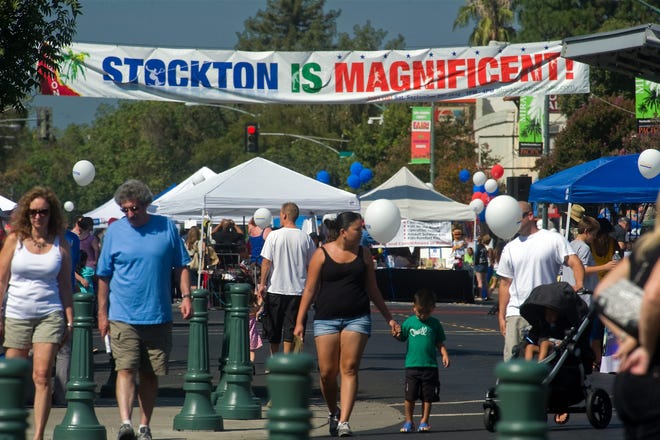 Hundreds of people turned out for the Stockton is Magnificent event on the Miracle Mile along Pacific Avenue in Stockton in 2012. The celebration this year will be held April 2. CLIFFORD OTO/RECORD FILE 2012