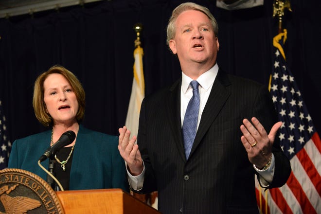 Illinois House Republican Leader Jim Durkin, right, and Senate GOP Leader Christine Radogno speak at a news conference in Chicago, Wednesday, Jan. 20, 2016, where they called for a state takeover of the financially troubled Chicago Public Schools. They said the proposed legislation would give the Illinois State Board of Education control over the nation's third-largest school district. (Brian Jackson/Chicago Sun-Times via AP) CHICAGO TRIBUNE OUT, MANDATORY CREDIT, MAGS OUT, NO SALES
