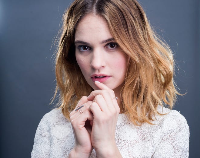 Actress Lily James poses for a portrait in promotion of her new television miniseries "War & Peace," on Wednesday, Jan. 27, 2016, in New York. James also has a role in the new film, "Pride and Prejudice and Zombies," releasing in U.S. theaters on Feb. 5, 2016.