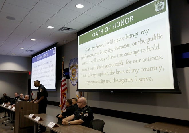 Gainesville Police Chief Tony Jones talks about the new Oath of Honor for the department during a town hall meeting on Wednesday.