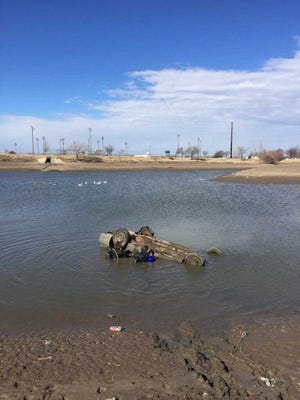 Provided Photo - Amarillo Police Department dive team members assisted with two different vehicles found in Martin Road Lake.