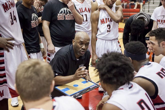 Milan boys basketball coach Chris Pope talks to his team. (Monroe News photo by ED KELLER)