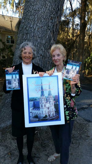 Photo special to the Savannah Morning NewsLaura Lawton and Polly Cooper show off the newly published "Savannah Guidebook." The Savannah natives took about two years to complete the extensive 368-page guidebook.
