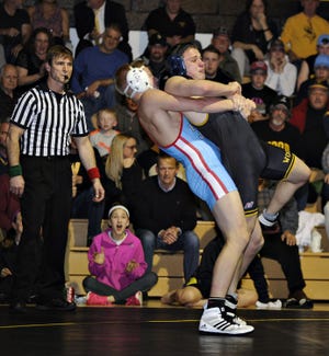 In the 170-pound weight class, Father Judge wrestler Erik Lindemann (left) takes down Archbishop Wood's Zach St. Thomas (right) Wednesday, Feb. 3, 2016 during the Philadelphia Catholic League championship match at Archbishop Wood in Warminster. Lindemann lost 5-2 and team lost to Father Judge 32-25.