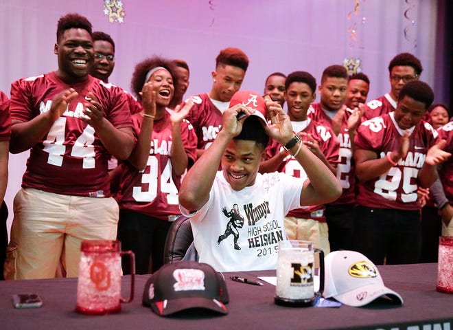 Joshua Jacobs of McLain High School in Tulsa, Okla., picks Alabama on National Signing Day. Photo/Mike Simons/Tulsa World