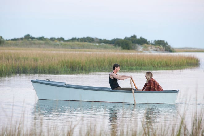 Travis (Ben Walker) and Gabby (Teresa Palmer) go for a row when the fighting stops.