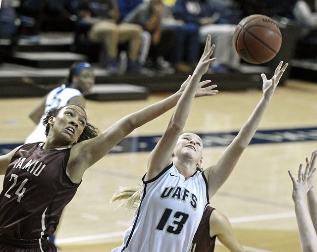 BRIAN D. SANDERFORD • TIMES RECORD UAFS’ Olivia Hanson, right, grabs an offensive rebound above TAMIU’s Rosebrooke Hunt on Thursday, Feb. 4, 2016 in the Stubblefield Center. 
 BRIAN D. SANDERFORD • TIMES RECORD UAFS’ Blandine N’Goran, from right, Olivia Hanson and Andrea Wilson pressure TAMIU’s Chelsea Salom during the first quarter on Thursday, Feb. 4, 2016 in the Stubblefield Center. 
 BRIAN D. SANDERFORD • TIMES RECORD UAFS’ Olivia Hanson, right, is fouled as she shoots by TAMIU’s Rosebrooke Hunt on Thursday, Feb. 4, 2016 in the Stubblefield Center. 
 BRIAN D. SANDERFORD • TIMES RECORD UAFS’ Candice Followwell, right, shoots over TAMIU’s Jessica Alvarez on Thursday, Feb. 4, 2016 in the Stubblefield Center.