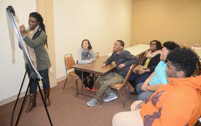 Kinston Teens talk as they meet for leadership training Thursday at the Kinston Enterprise Center.