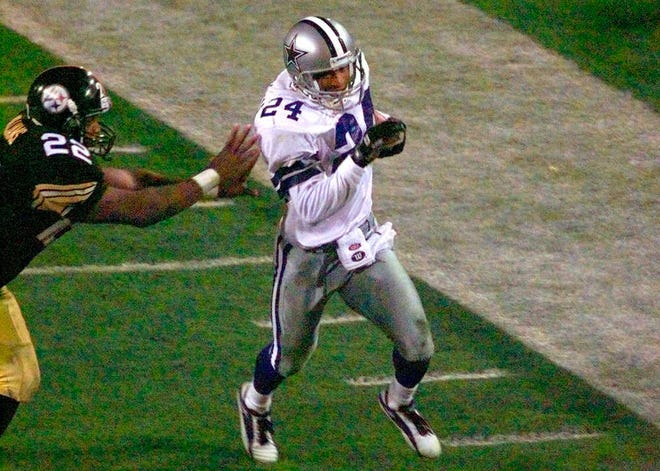 FILE - In this Jan. 28, 1996, file photo, Dallas Cowboys' Larry Brown (24) gets pushed out of bounds by Pittsburgh Steelers' John L. Williams after Brown intercepted a Neil O'Donnell pass late in the fourth quarter of NFL football's Super Bowl XXX in Tempe, Ariz. Brown intercepted two passes to set up two touchdowns in the Cowboys' 27-17 win over the Steelers. He parlayed that success into a lucrative free-agent contract with Oakland but never came close to replicating that success. (AP Photo/Beth Keiser, File)
