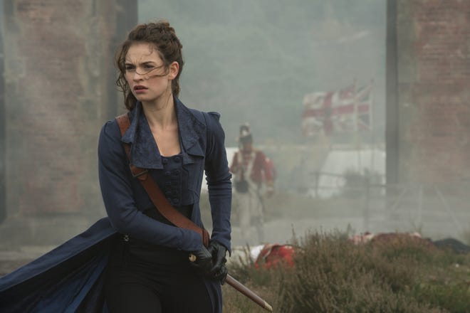 Lizzy Bennett (Lily James) prepares to unsheathe her sword in “Pride and Prejudice and Zombies.” Courtesy Photo