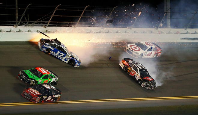 Austin Dillon in the No. 3 Chevy and Ricky Stenhouse Jr. in the No. 17 Ford tangle during a run in the Sprint Unlimited. This is why NASCAR drivers use backup cars in the non-points race. GETTY IMAGES/MATT SULLIVAN