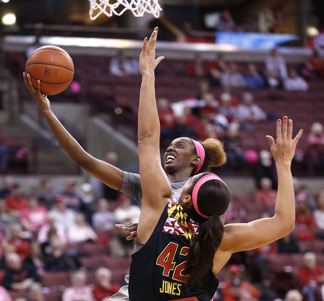 Ohio State's Alexa Hart scores against Maryland center Brionna Jones in the first half.