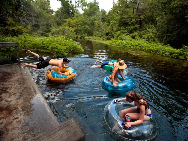 Visitors tube from the head springs of Ichetucknee Springs State Park in Fort White in this June 18, 2014 file photo.