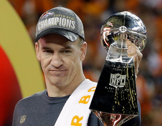 Denver Broncos’ Peyton Manning holds up the trophy after the NFL Super Bowl 50 football game Sunday, Feb. 7, 2016, in Santa Clara, Calif. The Broncos won 24-10. (AP Photo/Julie Jacobson)