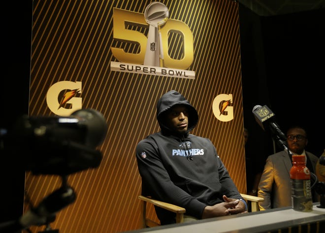 Carolina Panthers’ Cam Newton answers questions after Super Bowl 50 on Sunday night. Associated Press/Marcio Jose Sanchez