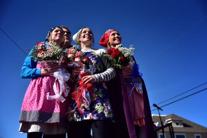 Summer Parsons, 28, a physical education teacher in Liberal, won the Liberal leg of the International Pancake Day race. The top three winners from left, Sally Yates, third, Leslie Spikes, second, and Summer Parsons, first place.