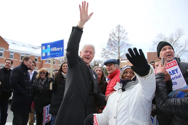 Former President Bill Clinton waves to students in the windows of Portsmouth Middle School Tuesday during a campaign stop for his wife Hillary Clinton on New Hampshire primary day.

Photo by Rich Beauchesne/Seacoastonline