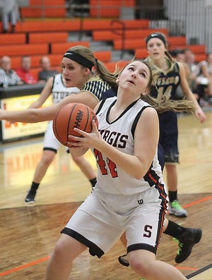 Camryn Hamlin heads to the basket past an Otsego defender on Tuesday night.