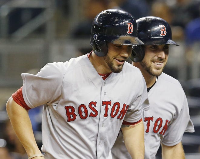 After being forced into duty at the major-league level sooner than expected, Blake Swihart (front) began to deliver on his potential late last season and will be in the mix with Ryan Hanigan and Christian Vazquez to be the Red Sox' starting catcher.