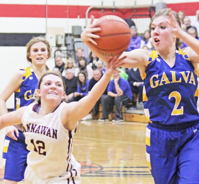 Annawan’s Kaley Jackson (12) and Galva’s Grace Clucas (2) pursue a loose ball during Wednesday night’s regional semifinal game at Wyoming.