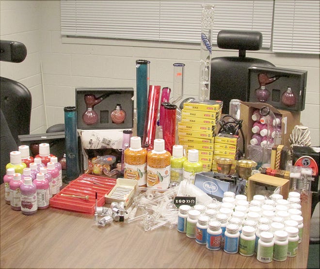 Bob Miller gave these items from his Kewanee Liquor and Tobacco store to the police for disposal. Miller said he felt uncomfortable about having the items, which could be used with illegal drugs, in his store.
