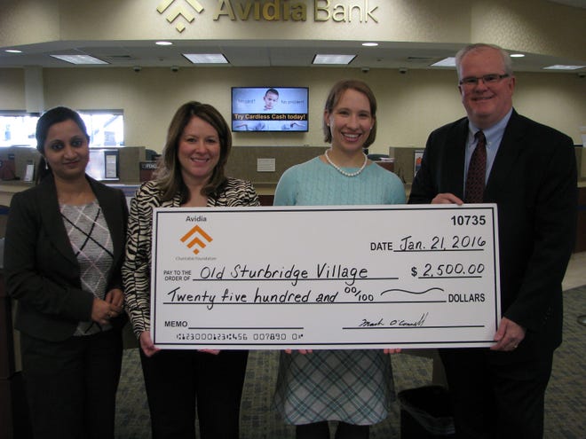 Presenting the check, from left: Gargi Dutta Roy, Shrewsbury assistant branch manager of 

Avidia Bank; Stephanie Luz, Shrewsbury assistant vice president market manager of Avidia Bank; Anne McBride, associate director of development of Old Sturbridge Village; Mark R. O’Connell, president and CEO of Avidia Bank. Courtesy Photo