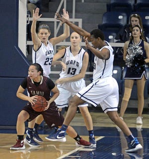 BRIAN D. SANDERFORD • TIMES RECORD UAFS’ Blandine N’Goran, from right, Olivia Hanson and Andrea Wilson pressure TAMIU’s Chelsea Salom during the first quarter on Thursday, Feb. 4, 2016 in the Stubblefield Center. 
 BRIAN D. SANDERFORD • TIMES RECORD UAFS’ Candice Followwell, right, shoots over TAMIU’s Jessica Alvarez on Thursday, Feb. 4, 2016 in the Stubblefield Center. 
 BRIAN D. SANDERFORD • TIMES RECORD UAFS’ Olivia Hanson, right, is fouled as she shoots by TAMIU’s Rosebrooke Hunt on Thursday, Feb. 4, 2016 in the Stubblefield Center.