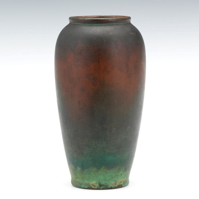 A bronze vase created by Charles Clewell.