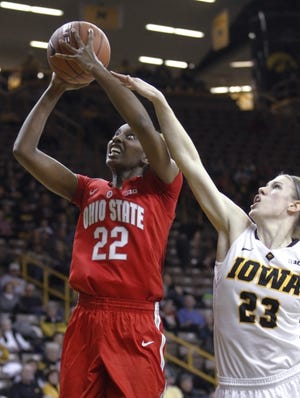 Ohio State's Alexa Hart, who scored 13 points, goes to the basket against Iowa's Christina Buttenham.