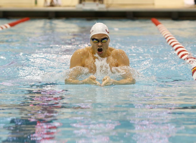 Anton McKee swims breast stroke against Auburn on Oct. 9, 2015.