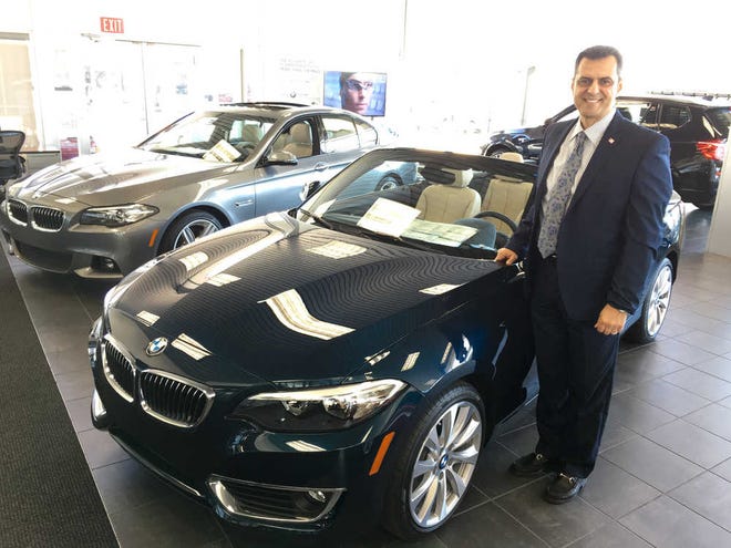 Joe.DeSalvo@jacksonville.com Telis Assimenios, COO and general manager of the Tom Bush Family of Dealerships, is celebrating his 30th year with the company, selling such models as the 2016 BMW 228i convertible and 328i sedan.
