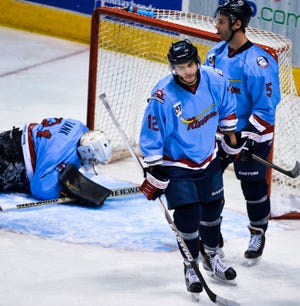 Rivermen players react after a Louisiana score in the first period.