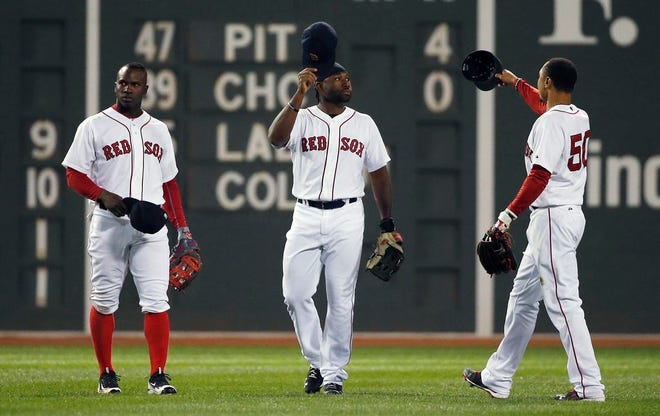 It was no coincidence that the Red Sox' pitching improved after the team began starting an outfield consisting of Rusney Castillo, left, Jackie Bradley Jr., center, and Mookie Betts.