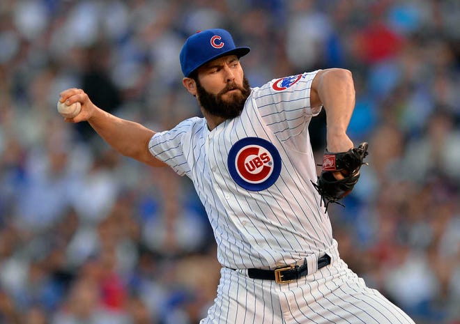 Chicago Cubs starting pitcher Jake Arrieta throws during the first inning of Game 3 in the National League division series against the St. Louis Cardinals in Chicago on Oct. 12, 2015.