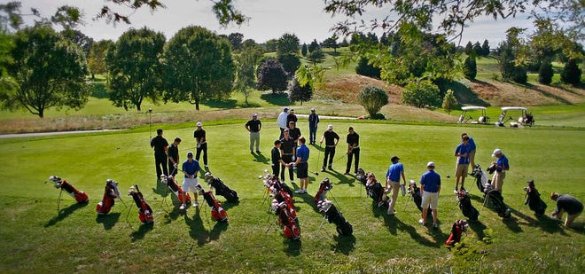 This photo from 2012 shows golfers gathered by the first tee at Presidents Golf Course in North Quincy.