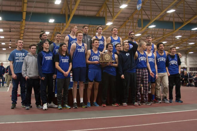 Members of the York High School boys track team gather after winning its second straight Class B state title on Saturday at Bates College. Courtesy photo/Elliot Gear