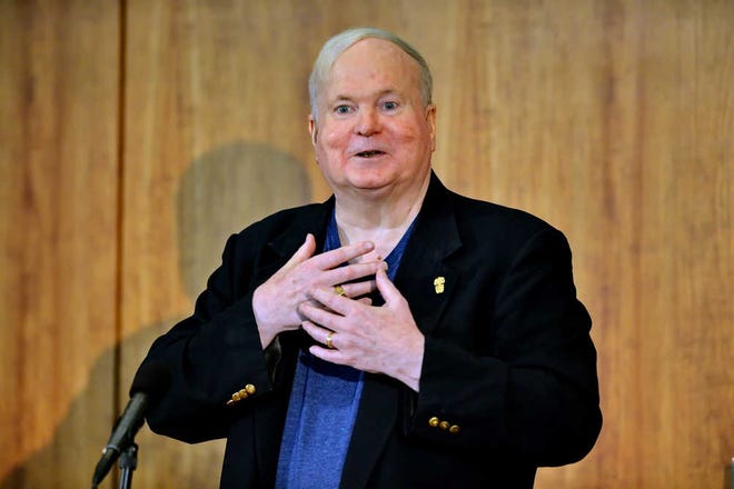 FILE - In this May 16, 2014, file photo, author Pat Conroy speaks to a crowd during a ceremony at the Hollings Library in Columbia, S.C. Conroy says he has pancreatic cancer, but promises he will fight the disease hard and finish a novel he owes his fans. The South Carolina novelist made the announcement Monday, Feb. 15, 2016, on his Facebook page. (AP Photo/ Richard Shiro, File)