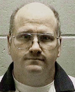 This undated photo released by the Georgia Department of Corrections shows death row inmate and former U.S. Navy sailor Travis Hittson in Georgia. Hittson, 45, convicted of killing a fellow sailor in Georgia, is scheduled to be executed later this month, state corrections officials said Tuesday, Feb. 2, 2016. (Georgia Department of Corrections via AP)