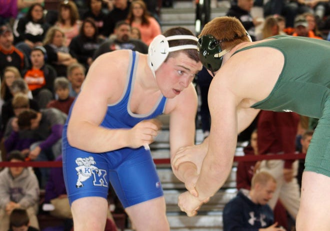 Kennebunk's Pat Saunders, left, wrestles against Oxford Hills' Kyle Dexter during a quarterfinal match at Saturday's Class A state meet at Noble High School.

Carl Pepin/Seacoastonline