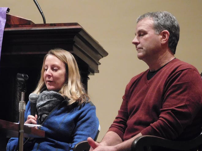 Jeanne, left, and Jim Moser speak emotionally about their son Adam's September death from a fentanyl overdose at a We The People forum in Exeter Wednesday night.

Photo by Erik Hawkins/Seacoastonline