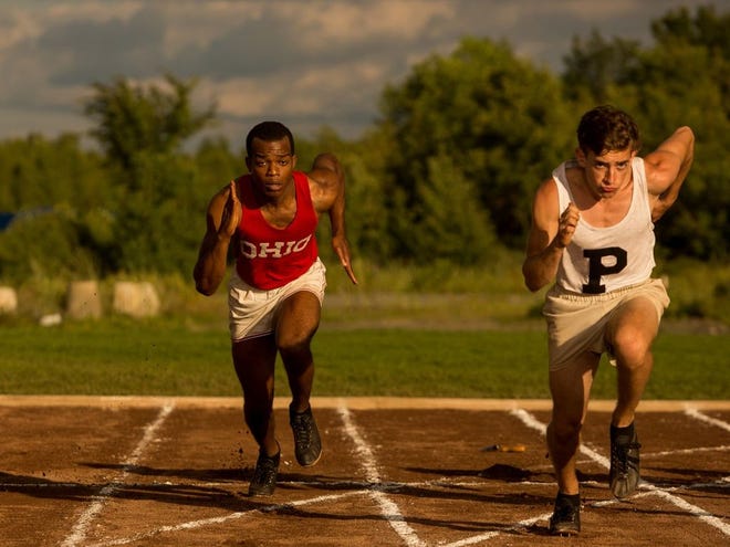 Stephan James, left, stars as Olympic runner and long-jumper Jesse Owens in "Race," which opens Friday in theaters nationwide. In Gainesville, the movie will be shown at Regal Butler Plaza. Special to the Guardian