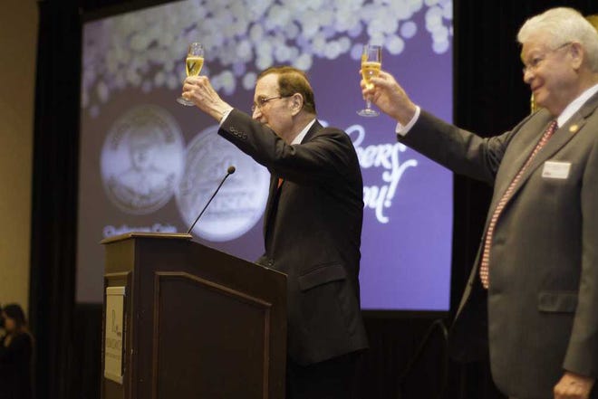 Special for Homes Watson Realty Corp. founder William A. Watson, Jr. (left) and Ed Forman, president, toasted more than 500 Watson sales associates during the company's regional awards celebration on Feb. 3.